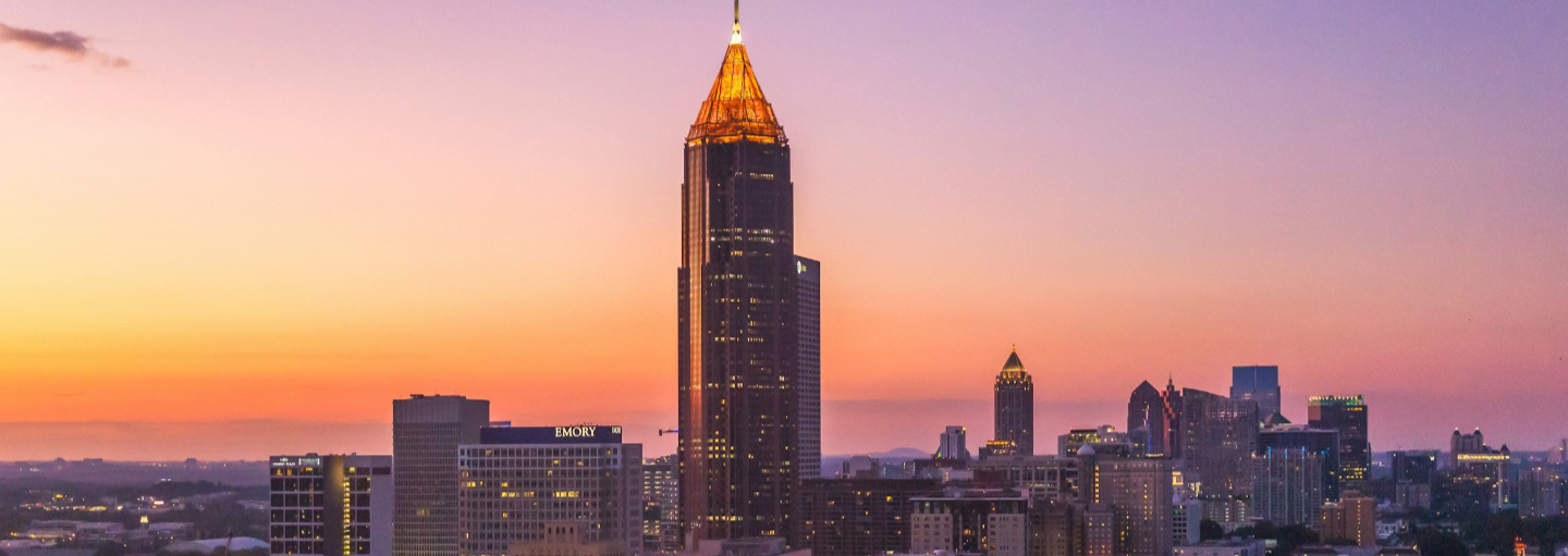 Atlanta skyline at sunset with pink and orange sky