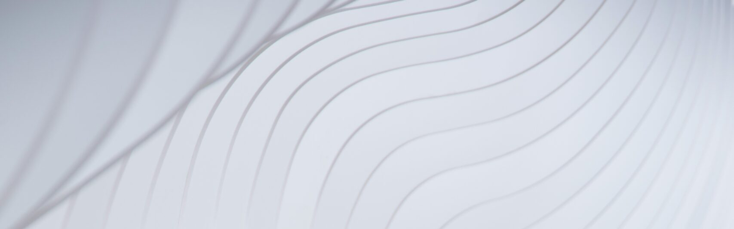 White graphic image of curved lines meeting minimalist picture